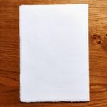 A5 size cardboard in ivory Amalfi handmade paper for wedding invitation. Size 15x21