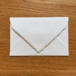 White envelope in Amalfi paper. Size 12x18.