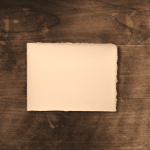 Amalfi handmade paper wedding invitation cards in rosy ivory color. Size 11x9 cm.