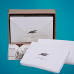 Box with wedding invitation cards and envelopes in Amalfi paper. Ticket size 13x8. Envelope size: 14x9cm. Color: ivory