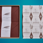 Box of cards and envelopes in sepia coloured Amalfi paper. Size: 11x7cm.
