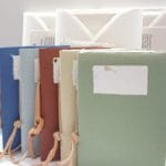 Amalfi paper gift box containing stationery with associated envelopes and a hand-bound notebook with cover in a color of your choice.