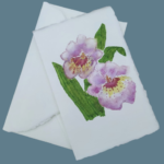 Wedding invitations in Amalfi paper decorated with an orchid made in watercolor.