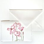 Placeholders with flowers for wedding tables created in Amalfi handmade paper.