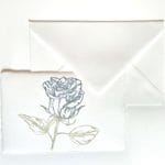 Placeholder with blue rose in Amalfi paper and matching ivory envelope