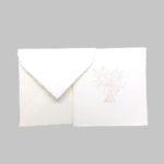 Square invitations in Amalfi handmade paper with a decoration of a Bouquet in antique pink. Ivory color. Size 15x15