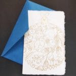 Amalfi paper folding cards with a Christmas ball decoration with handmade gilding in relief.