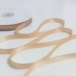 Salmon colored double satin ribbons for closing and sealing wedding invitations in Amalfi paper