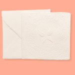 Wedding invitations with butterfly embossed on ivory Amalfi paper.