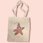 The shopper made from watercolor creations by Lo Scrigno di Santa Chiara. This pattern is embellished with a stylized image of a starfish